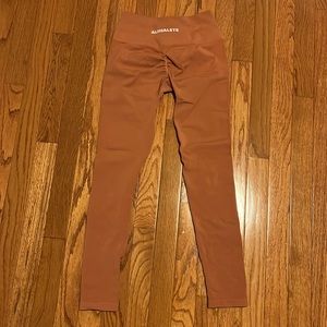 Burnt orange Alphalete Amplify legging